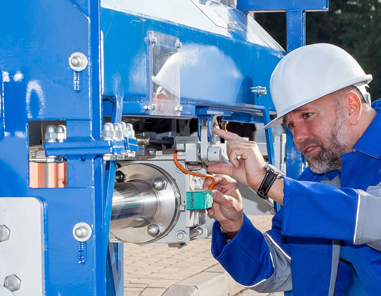Clyde Bergemann worker fixing machinery
